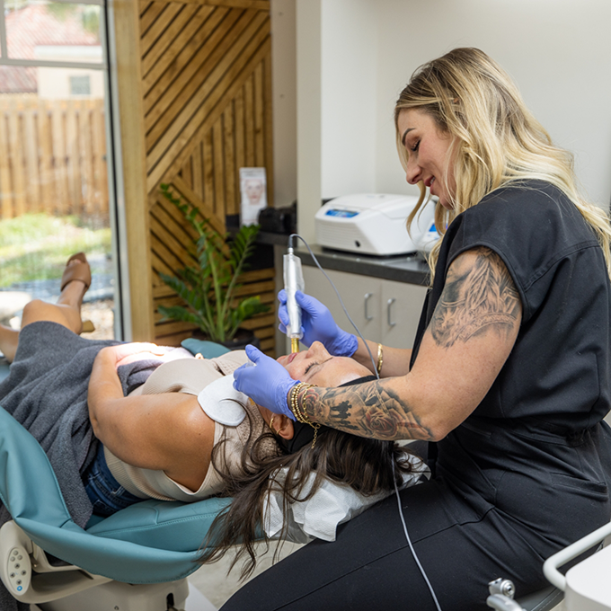 Esthetic patient receiving a treatment
