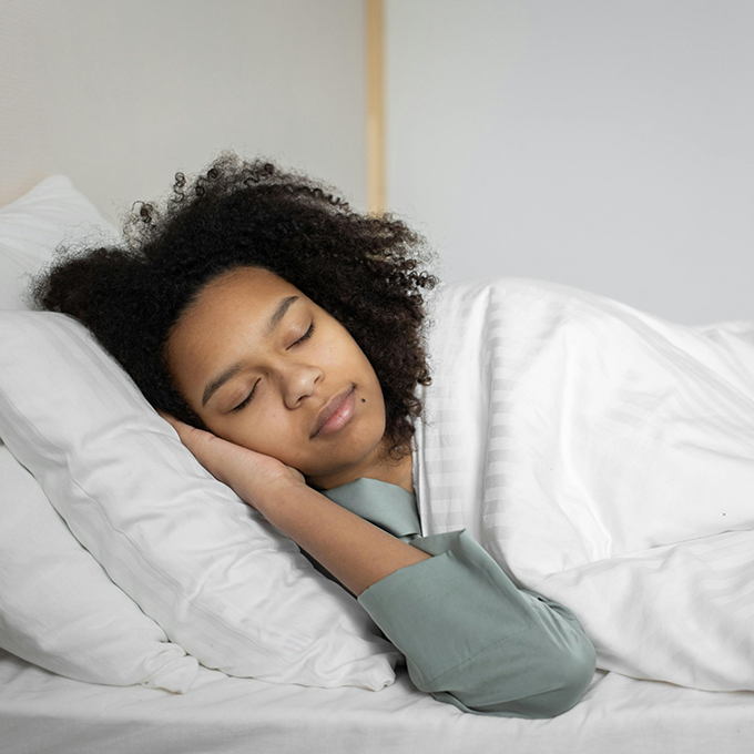 Woman sleeping soundly on her side