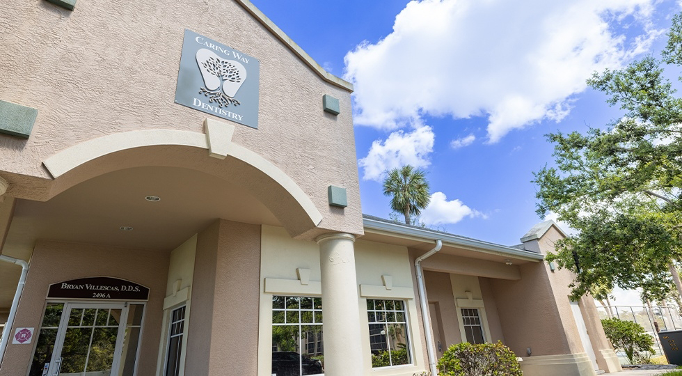 Front exterior of Caring Way Dentistry office building