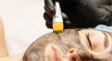 Person receiving an esthetic treatment on their face