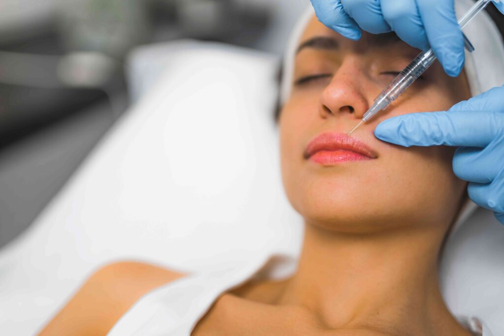 Woman getting an injection in her lip